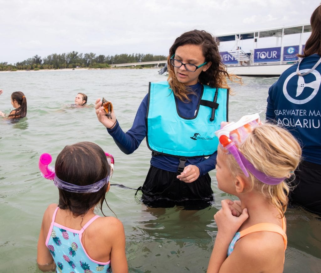 CMA Summer Camp Instructor Teaching Campers While Snorkeling
